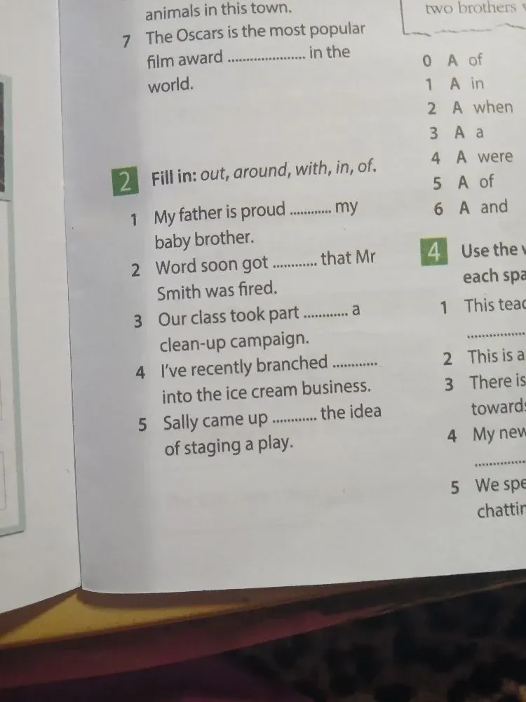 Fill in: out, around, with, in, of.