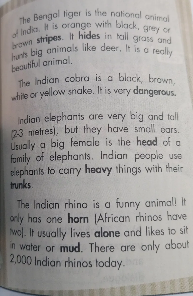 Прочитайте текст о животных Индии: Bengal tiger, Indian cobra, Indian elephants, Indian rhino.