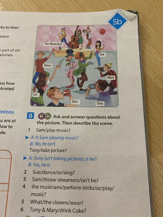 Ask and answer questions about the picture. Then describe the scene.