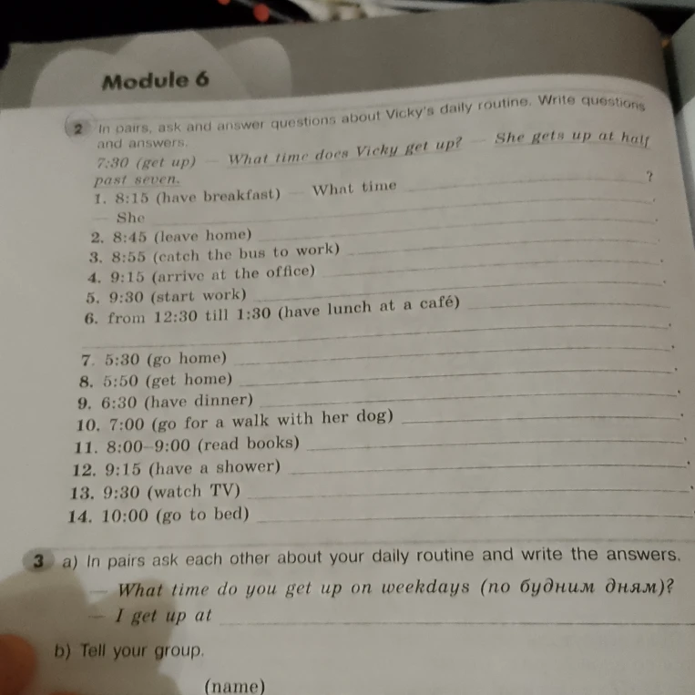 In pairs, ask and answer questions about Vicky's daily routine. Write questions and answers.