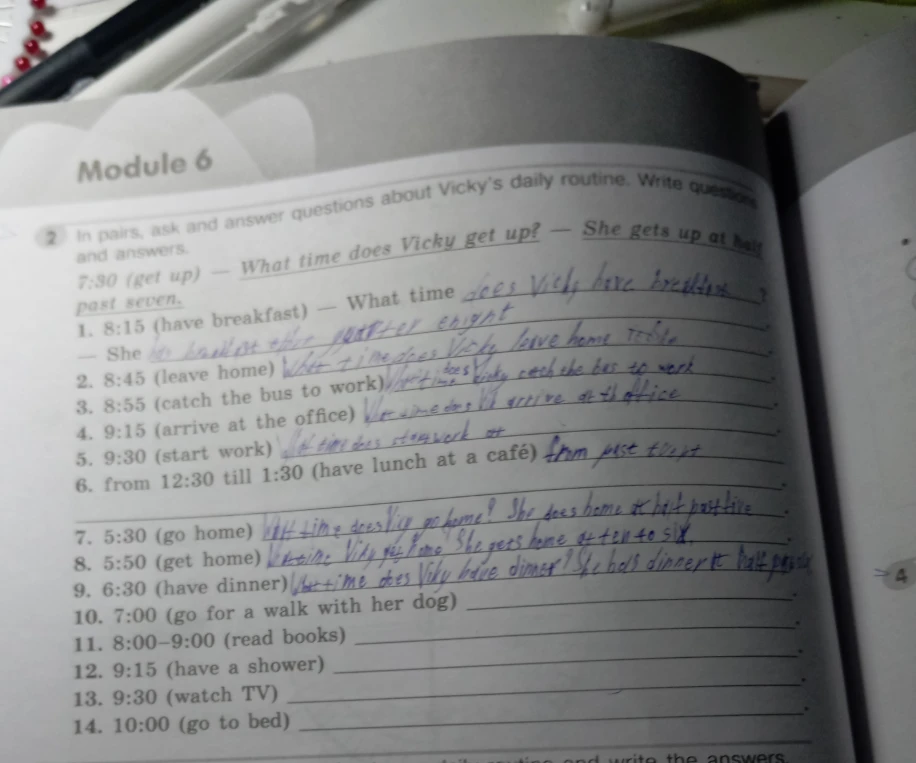 In pairs, ask and answer questions about Vicky's daily routine. Write questions and answers.