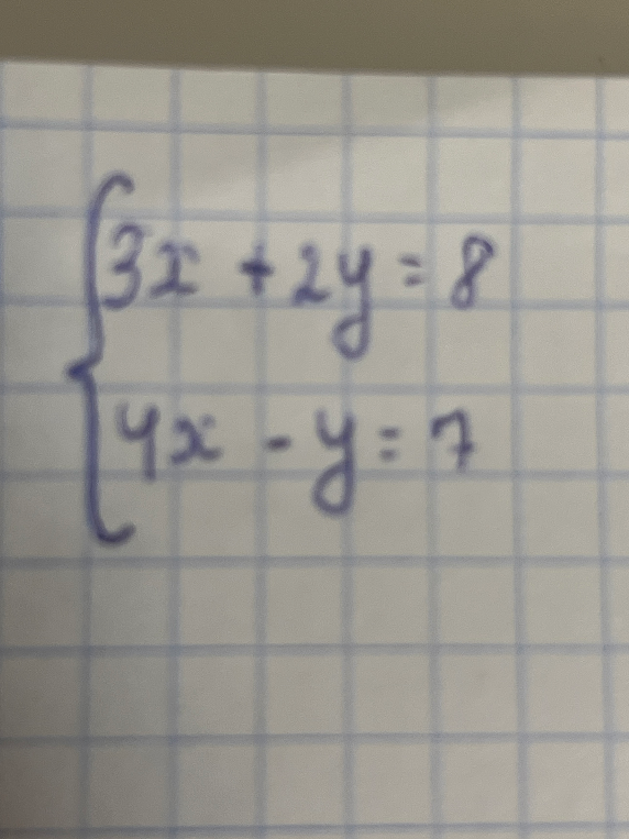 Решите систему уравнений: 3x + 2y = 8; 4x - y = 7