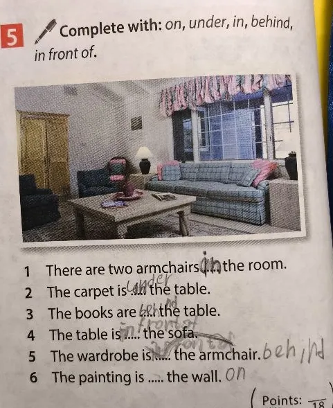 Complete with: on, under, in, behind, in front of.
