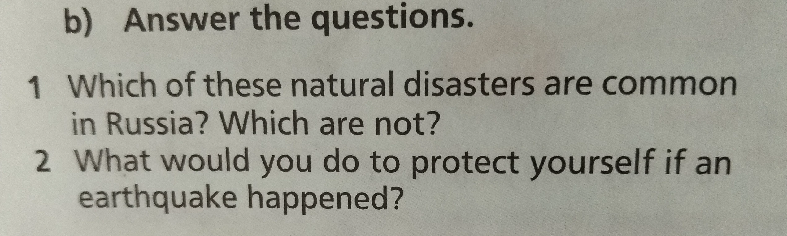b) Answer the questions. 1 Which of these natural disasters are common in Russia? Which are not? 2 What would you do to protect yourself if an earthquake happened?