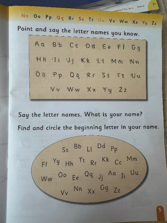 Point and say the letter names you know.