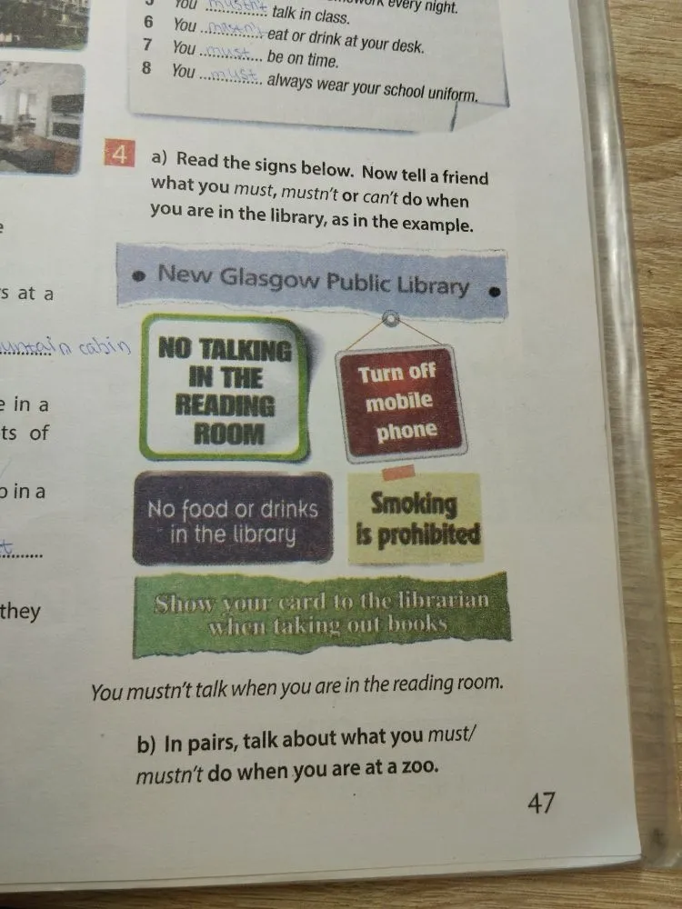 Read the signs below. Now tell a friend what you must, mustn't or can't do when you are in the library, as in the example.