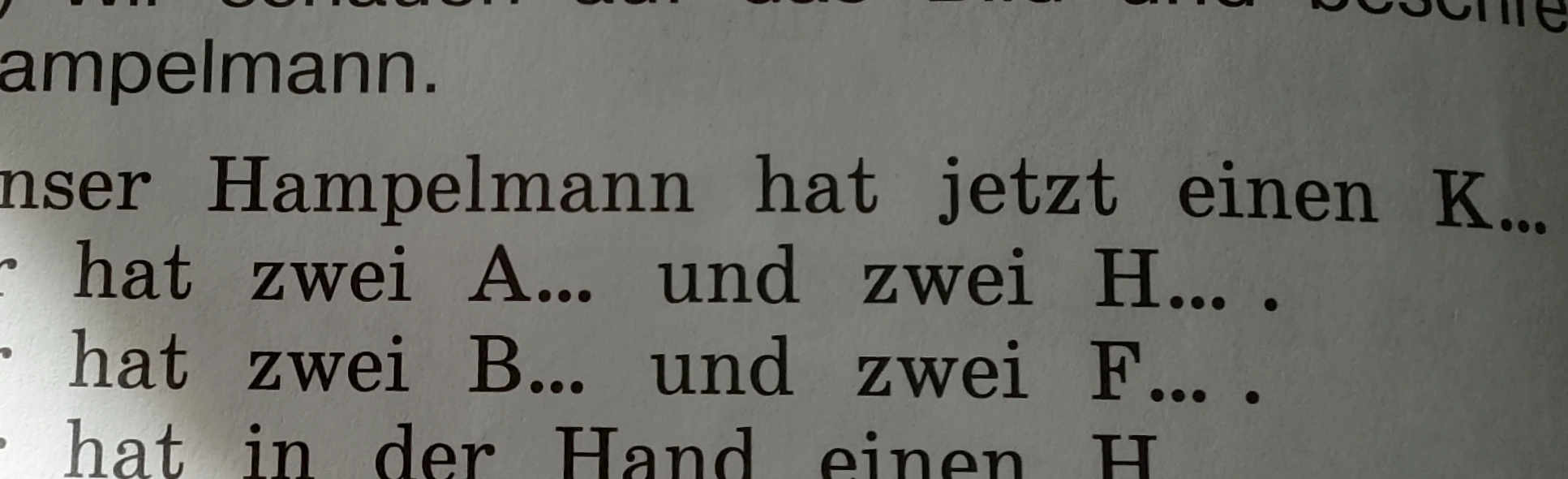 Unser Hampelmann hat jetzt einen K... hat zwei A... und zwei H... . hat zwei B... und zwei F... . hat in der Hand einen H...
