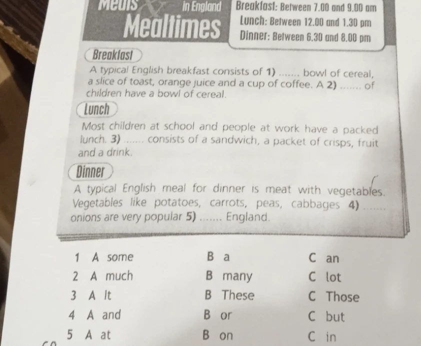 A typical English breakfast consists of 1) ....... bowl of cereal