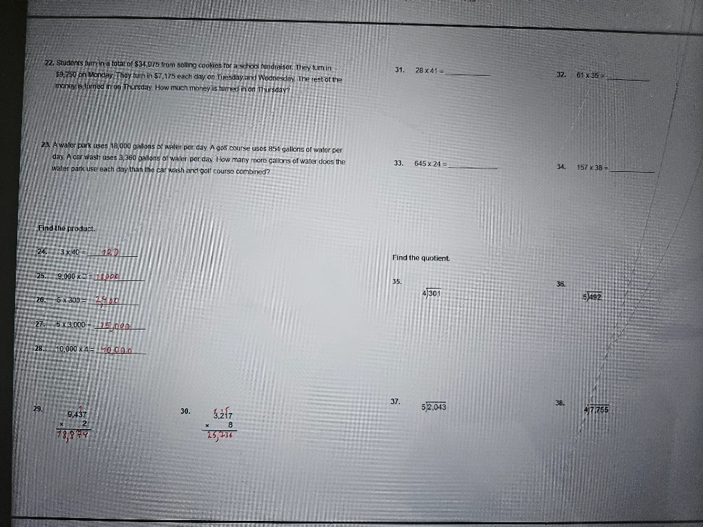 Students turn in a total of $34,975 from selling cookies for a school fundraiser.