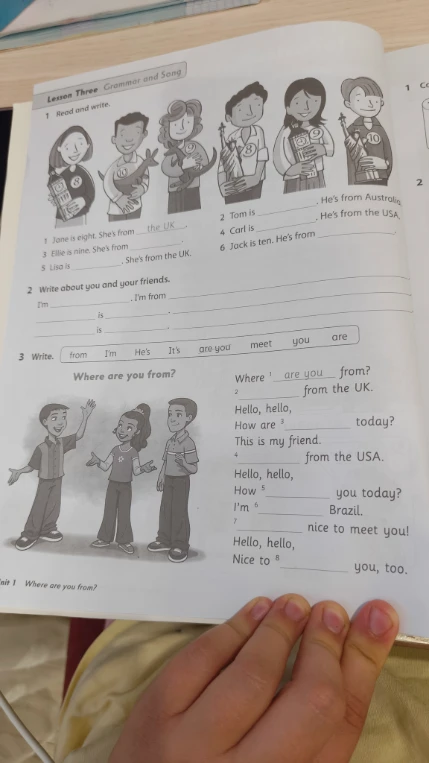 1 Read and write. 1 Jane is eight. She's from the UK.