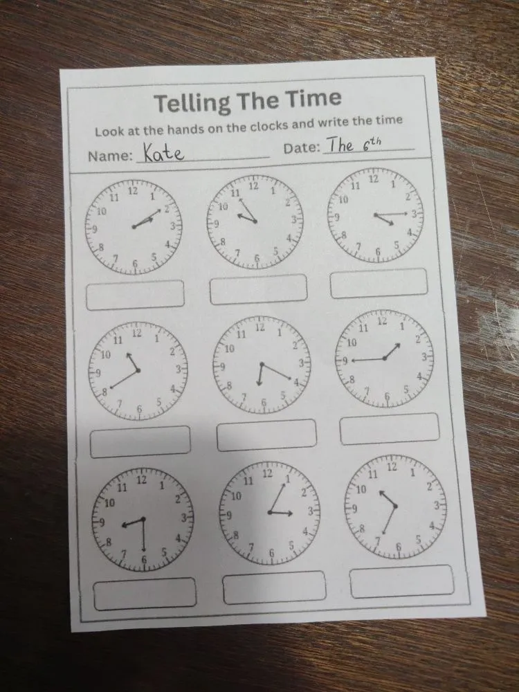 Telling The Time Look at the hands on the clocks and write the time