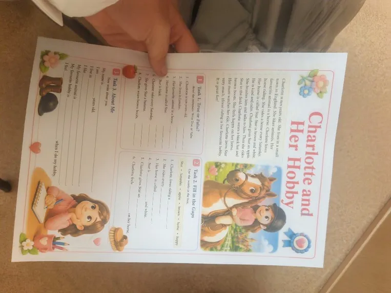 Charlotte is ten years old. She lives in a small town in England. She likes animals. Her favourite animal is a horse. Charlotte loves horse riding. She rides a horse every Saturday. Her horse is called Star. Star is brown and white. He is kind and calm. Charlotte gives Star an apple.